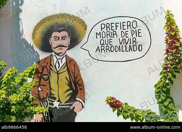 Prefiero morir de pie que vivir arrodillado I'd rather die standing than live kneeling, wall art graffiti of Emiliano Zapata, Merida, Mexico, Central America.