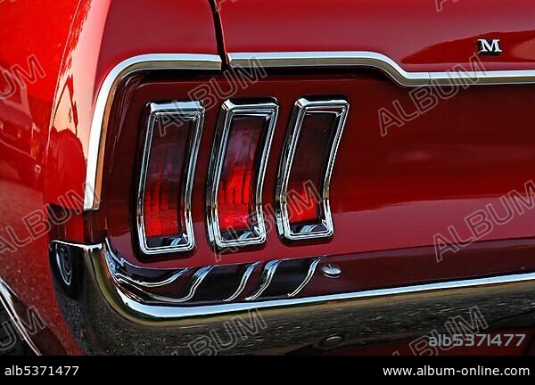 Detail of a classic car, rear light of a Ford Mustang Convertible, built in 1967, 147 kW, 200 hp.