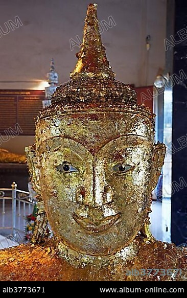 Buddha statue covered with gold leaf, Temple Wat Phra Thong, Phuket, Thailand, Asia.