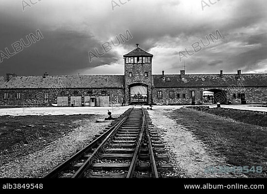 Main guard house and train tracks, Auschwitz II-Birkenau extermination camp, Oswiecim, Poland, Europe.