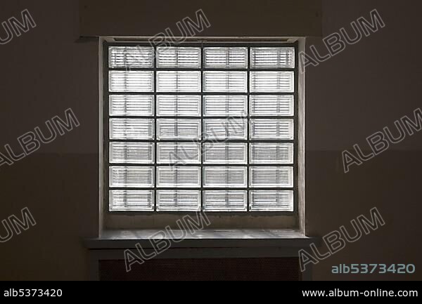 Typical prison window made up of glass brick, Berlin-Hohenschoenhausen memorial, former prison of the GDR's secret service, Berlin, Germany, Europe.