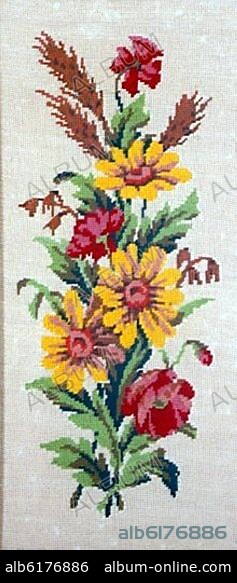 FLORES BORDADAS EN PETIT POINT.