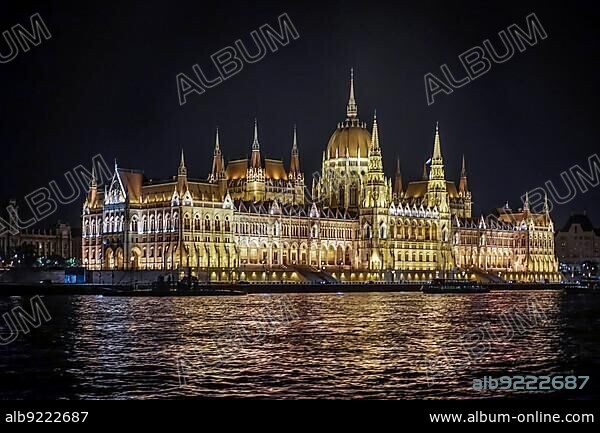 Hungarian Parliament building illumintaed at night in Budapest.