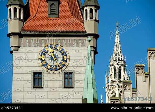 Tower of old city hall with and the tower of the cityhall Munich Bavaria Germany.