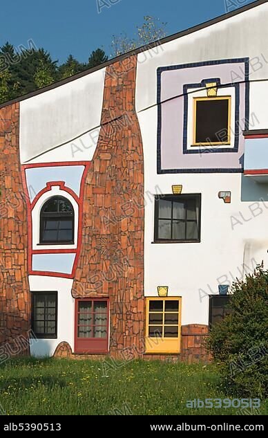 Facade detail of Ziegelhaus, Brick House of the Rogner Bad Blumau hotel complex, designed by architect Friedensreich Hundertwasser, in spa town Bad Blumau, Styria, Austria, Europe.