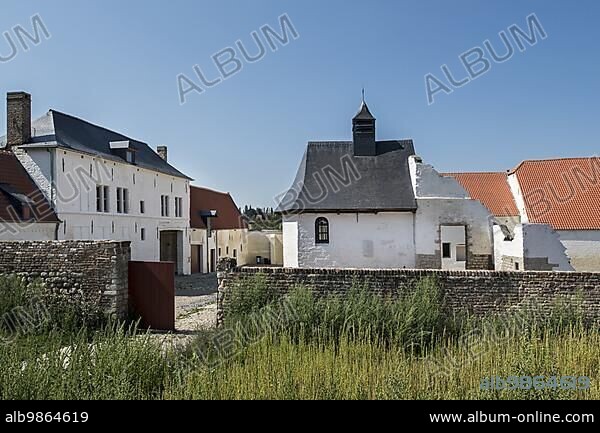 Courtyard showing chapel and gardener s house of the Château d'Hougoumont, farmhouse where British and other allied forces faced Napoleon's Army at the Battle of Waterloo on June 18, 1815, Braine-l'Alleud, Belgium, Europe.