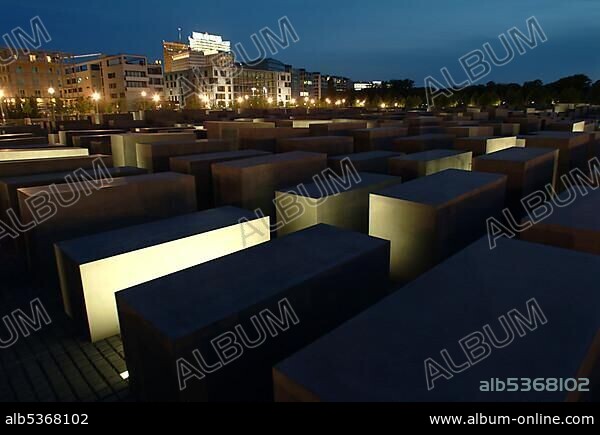 Holocaust Memorial designed by architect Peter Eisenman, memorial to the murdered jews of Europe, with a view of the skyline of the Potsdamer Platz square, Tiergarten district, Mitte district, Berlin, Germany, Europe.