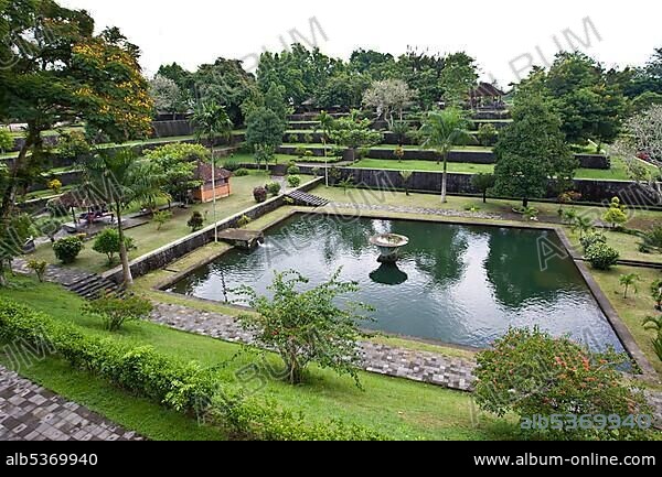 Pond and gardens, Large Hindu and Muslim temple, Taman Narmada, Lombok Island, Lesser Sunda Islands, Indonesia, Asia.