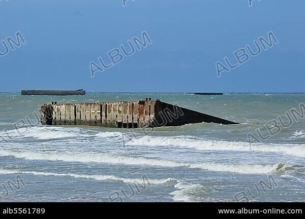 Concrete boxes, known as Phoenix Caissons, in the sea were used as breakwaters and to form an improvised harbour, Mulberry harbour, off Gold Beach during World War II near Arromanches, Normandy, France, Europe.