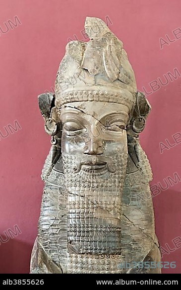 Antique statue of Achaemenids, face with a long beard, Sphinx or Minotaur, found in ancient Persian royal capital Persepolis, National Museum of Iran, Tehran, Iran, Asia.