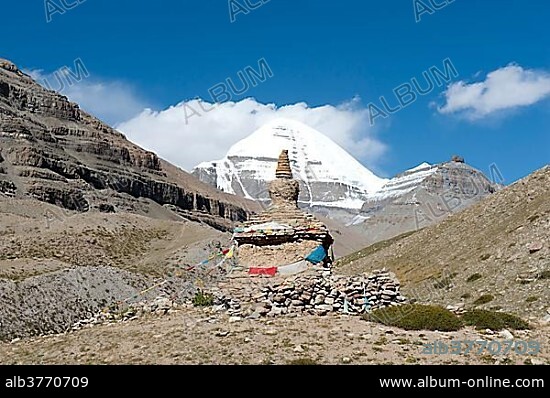 Tibetan Buddhism, ancient Stupa, snow-capped sacred Mount Kailash, Gang Rinpoche, south side with channel, pilgrim road at the monastery Gompa, Kora, Ngari, Gang-Tise Mountains, Trans-Himalaya, Himalaya, West Tibet, Tibet Autonomous Region, People's Republic of China, Asia.