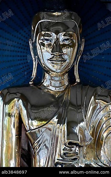 Shimmering chrome Buddha statue, Shwedagon-Paya, Yangon, Rangoon, Burma, Myanmar, Southeast Asia, Asia.