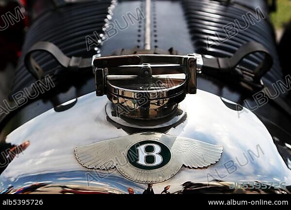 Bentley logo on the hood of a vintage car.