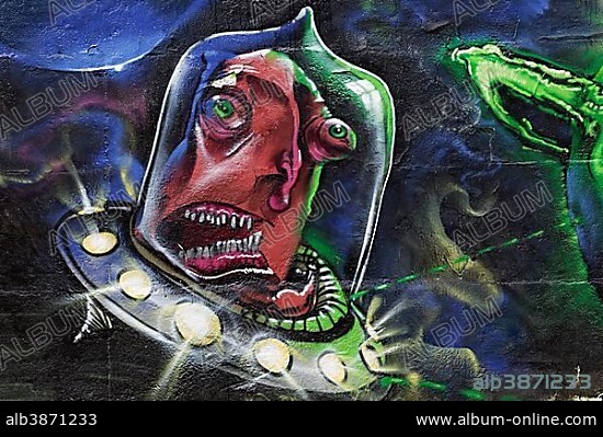 Alien in a UFO, graffiti, North Rhine-Westphalia, Germany, Europe.