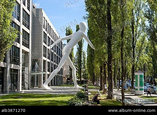 Walking Man sculpture by Jonathan Borofsky in front of insurance company Munich Re, Leopoldstrasse, Schwabing, Munich, Upper Bavaria, Bavaria, Germany, Europe.
