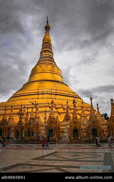 Shwedagon Pagoda Temple shining in the beautiful sunset in Yangon, Myanmar (Burma).