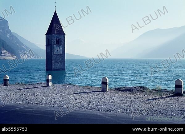 Sunken church tower in Graun, reservoir, landmark, Reschensee, tower, fascism, Reschen, disenfranchisement, disenfranchised, history, historical, flooding, inundation, power generation, power plant, power generation, seventies, seventies, historical, Vinschgau, South Tyrol, Italy, Europe.