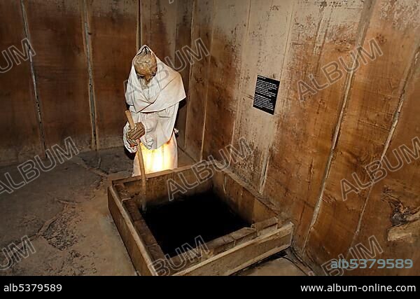 Figure of a saline workman in a white robe, Deutsches Salzmuseum or German Salt Museum, Lueneburg, Lower Saxony, Germany, Europe.