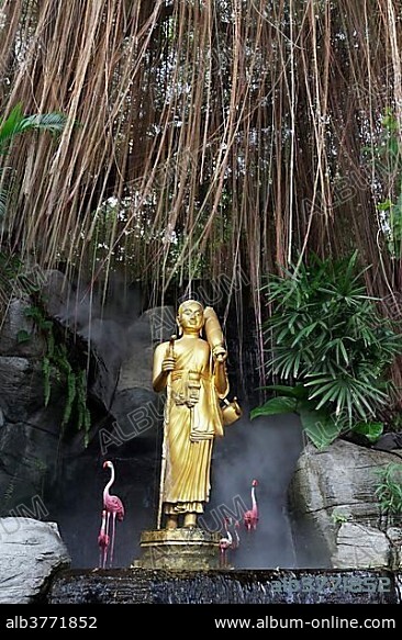 Buddha statue and artificial flamingos, staircase at Phu Khao Thong, Golden Mountain, in What Saket, Pom Prap Sattru Phai district, Bangkok, Thailand, Asia.