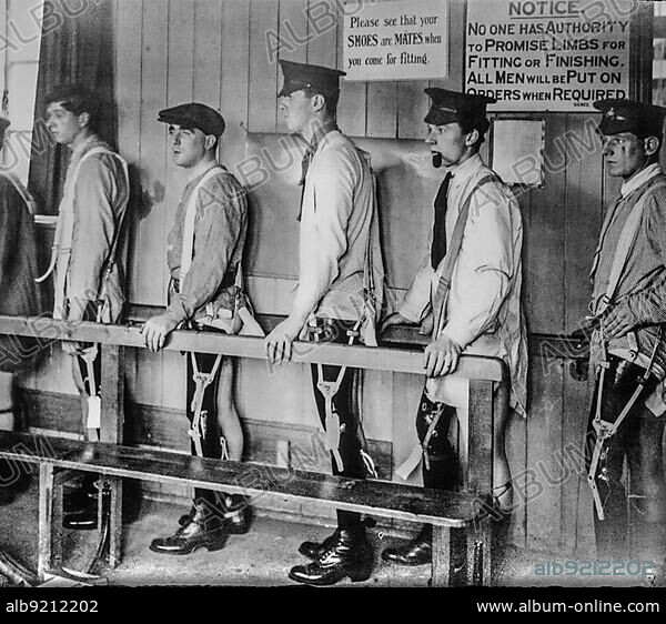 British WWI soldiers, leg amputees fitted with artificial limbs, prosthetic legs at Roehampton House hospital in London during First World War One.