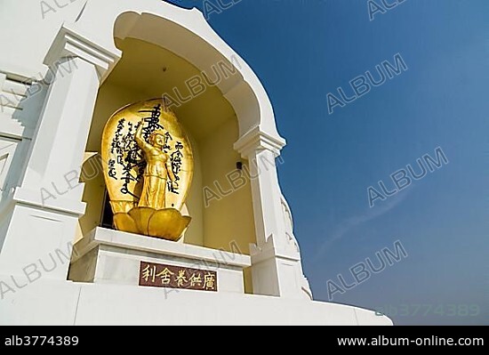 Detail of the Japanese Peace Pagoda, one of the many international Buddhist temples surrounding the birthplace of Buddha Siddhartha Gautama, Lumbini, Rupandehi, Nepal, Asia.
