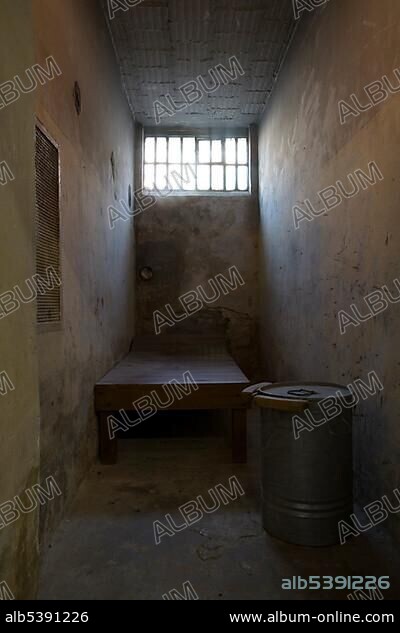 Prison cell, solitary confinement, cot with toilet bucket, Berlin-Hohenschoenhausen memorial, former prison of the GDR's secret service, Berlin, Germany, Europe.