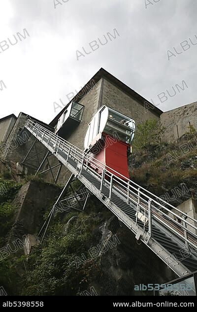 Modern meets history: The inclined elevator of the castle of Bard, hosting the ultra modern and recently opened museo delle Alpi, Aosta valley, Italy, Europe.