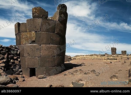 Burial towers called chullpas, of the Aymara people from the Colla culture above Lake Umayo near Puno, conquered by the Incas in the 15th Century and reused, Puno, Peru, South America.
