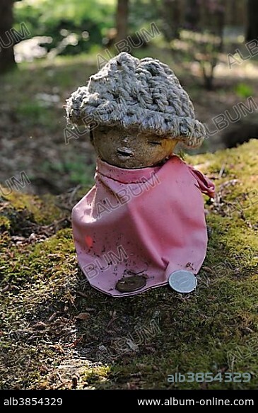 Buddhist Jizo figure in the moss garden of the Sanzen-in Temple, in Ohara near Kyoto, Japan, Asia.