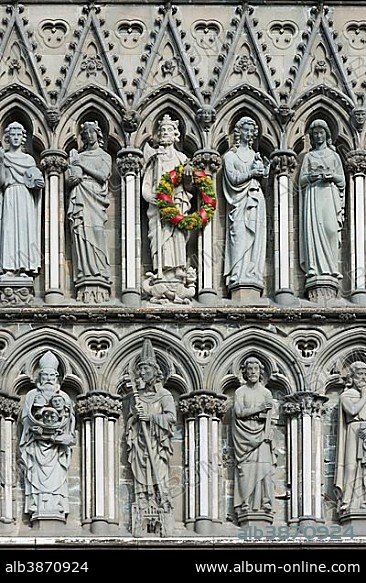 West facade on Nidaros Cathedral in Trondheim, detail with statues of saints, King Olaf II Haraldsson is decorated with a wreath, Trondheim, Sør-Trøndelag, Trøndelag, Norway, Europe.