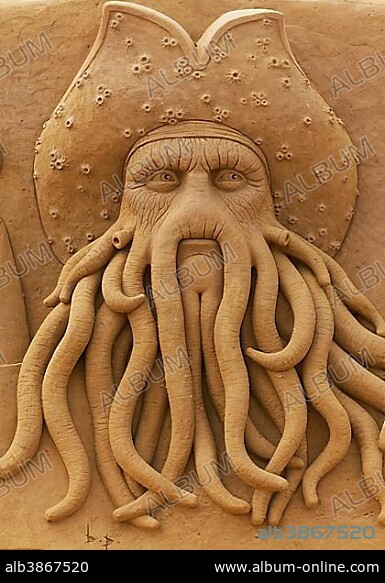 Fantasy character Davy Jones, sand sculpture, tentacle beard, from the film Pirates of the Caribbean, Sand Sculpture Festival Frozen Summer Sun, Oostende, West Flanders, Belgium, Europe.