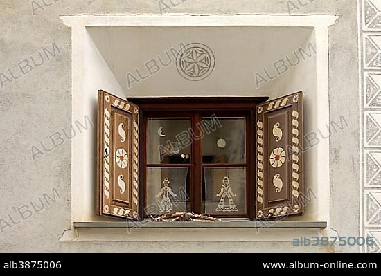 Window of an Engadin house decorated with Sgraffito, Scuol, Canton of Graubünden, Switzerland, Europe.