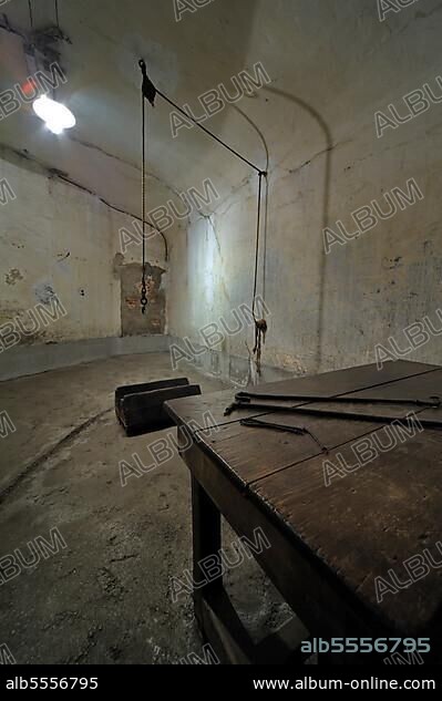 Torture instruments on the table in the torture chamber at Fort Breendonk, Belgium, Europe.