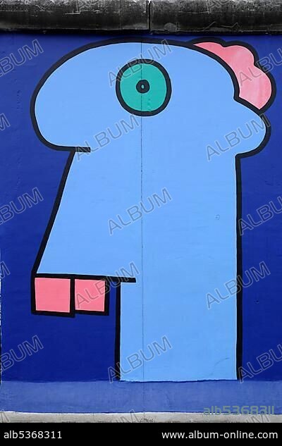 Thierry Noir, Head in a comic style, painting by Thierry Noir, Berlin Wall, East Side Gallery, Berlin, Germany, Europe.