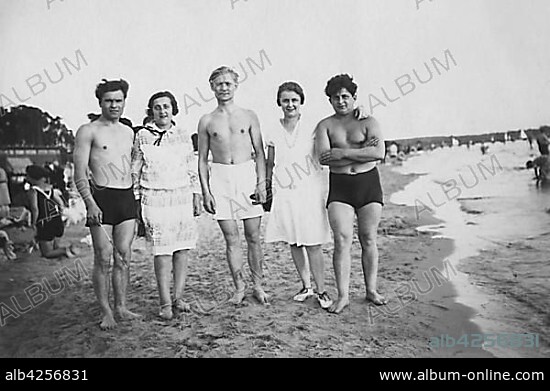 Five young people on the beach, two couples and one single, 1930s, Usedom, Baltic Sea, Germany, Europe.