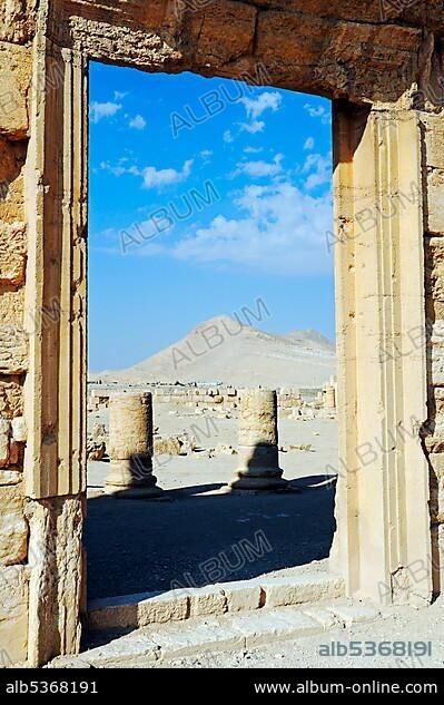 Window with view of the Agora in the Palmyra archeological site, Tadmur, Syria, Asia.