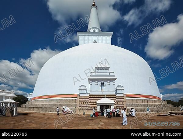 Anuradhapura, Sri Lanka, September 26, 2009: Mahatupa big Ruwanweliseya Dagoba, Buddhist stupa built by Sinhalese king Dutugemunu in the 2nd century BC, third largest in the world. Piligrimage site, Asia.