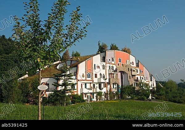Steinhaus, Stone House of the Rogner Bad Blumau hotel complex, designed by architect Friedensreich Hundertwasser, in spa town Bad Blumau, Styria, Austria, Europe.