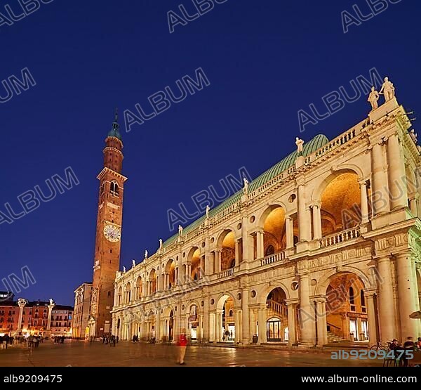 Vicenza, Veneto, Italy. The Basilica Palladiana is a Renaissance building in the central Piazza dei Signori in Vicenza. The loggia shows one of the first examples of what have come to be known as the Palladian window, designed by a young Andrea Palladio.
