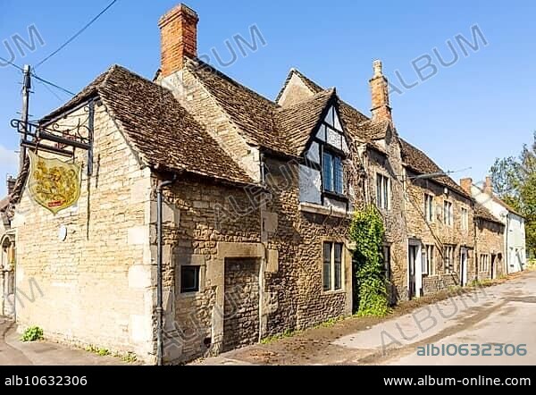 Historic former Red Lion pub in Melksham, Wiltshire, England, UK row cottages Cotswold stone.