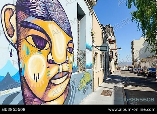 Graffiti, mural on the wall of a colonial house, Montevideo, Uruguay, South America.