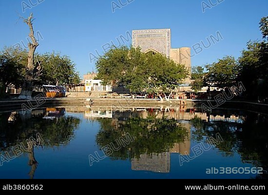 Reflection on water surface Khanaka Nadir Divan-Begi Lyab-i Hauz Bukhara Uzbekistan.