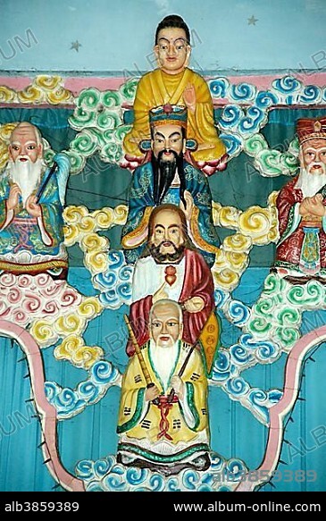 Colourful figures of Buddha, Mohammed and Jesus Christ in the Cao Dai Temple in Go Dao near the city of Ho Chi Minh, Saigon, Vietnam, Southeast Asia, Asia.