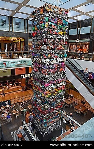 Atrium in the luxury shopping arcade The Q, with artwork The Tower of Klythie, artist John Chamberlain, Friedrichstraße, Berlin, Germany, Europe.