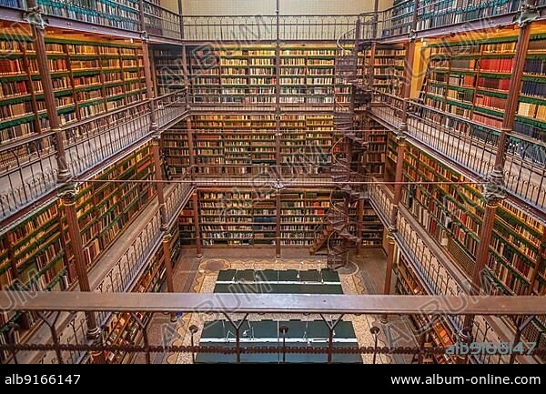 Books are piled high in the Rijksmuseum Research Library the largest public art history research library in the Netherlands. Amsterdam, Netherlands.