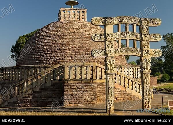 Stupa 3 with a single torana, gateway. Buddhist Monuments at Sanchi. UNESCO World Heritage Site. Sanchi, Madhya Pradesh, India, Asia.