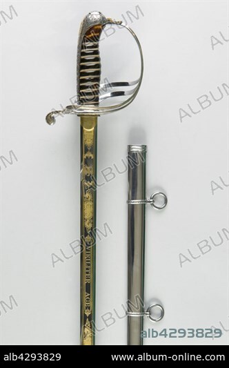 Sword from a foot troop officer. French Second Empire. Private collection. Hilt in engraved iron, polished. Guard with five branches engraved with leaves. Curved crossguard. Straight blade, gilded and engraved. On one of its sides: 'N' under imperial crown, war trophies and leaves, surrounding the inscription 'Prospere Procede et Regna', on the other side: imperial eagle, war trophies and leaves surrounding the inscription 'Viriliter Age'. Sheath in sheet iron, engraved with laurel and oak leaves. Sword that was given to the imperial prince Eugène Louis Napoléon Bonaparte by the bonapartist party on his 21st birthday.