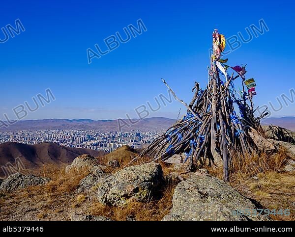 Khatas, prayer flags mark a summit and holy place, behind Ulan Bator, Mongolia, Asia.
