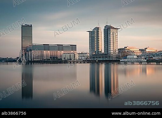 Allianz Tower on the River Spree, Molecule Man monument by American artist Jonathan Borofsky at the front, Berlin, Germany, Europe.