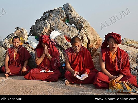 Monks on Vulture Peak, important Buddhist pilgrimage destination, Buddha's first place of meditation, Ragir, Rajgir, Rajagriha, Rajagaha, Bihar, India, Asia.